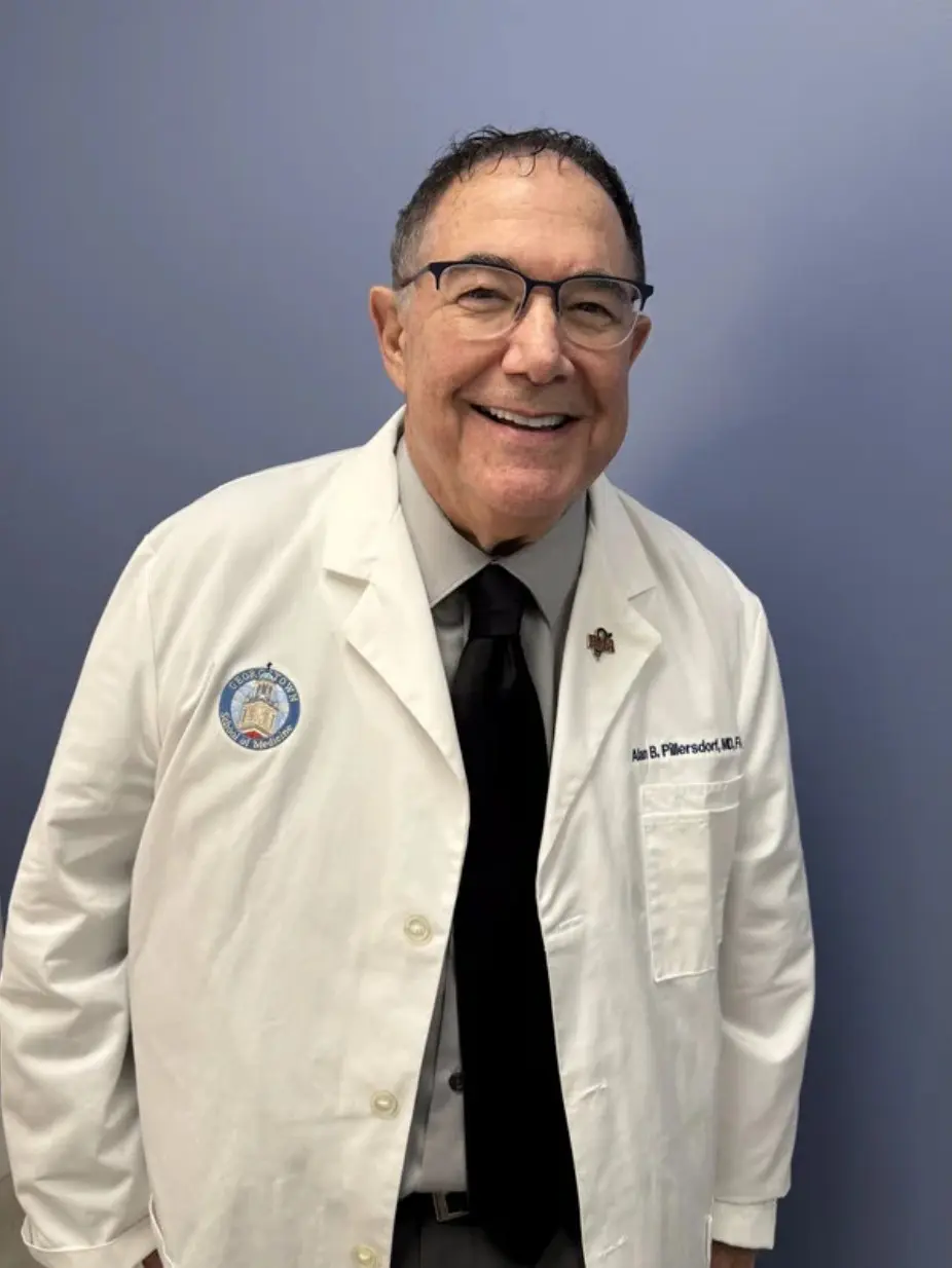 Dr. P white coat photo.webp_page-0001 Board Certified Plastic Surgeon