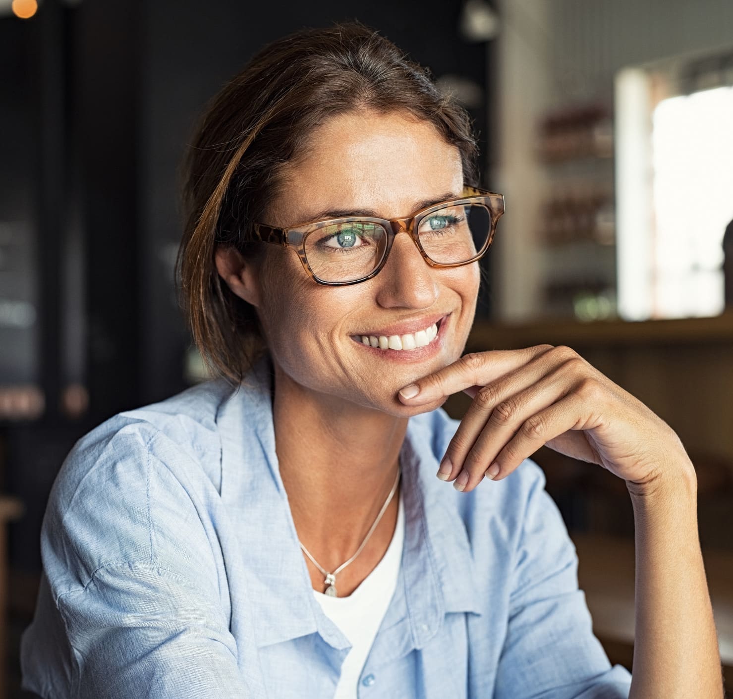 Smiling woman wearing spectacles Belotero® in West Palm Beach and Jupiter, FL