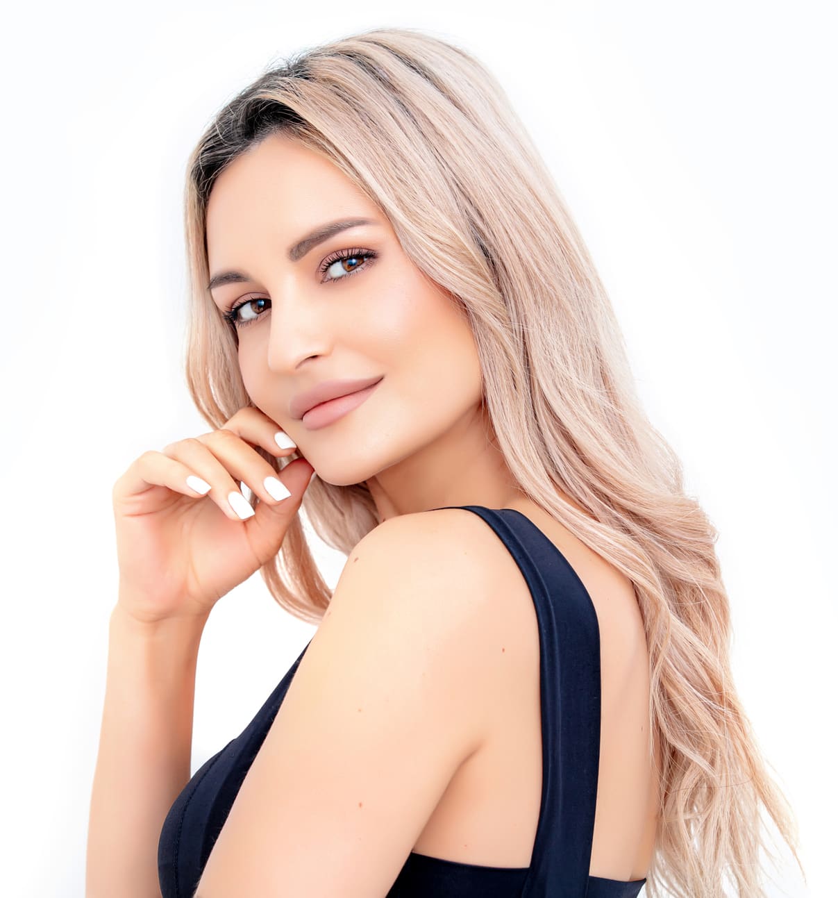 Portrait of a beautiful blonde woman with natural makeup on a white background. Studio shot. HydraFacial MD® in West Palm Beach and Jupiter, FL