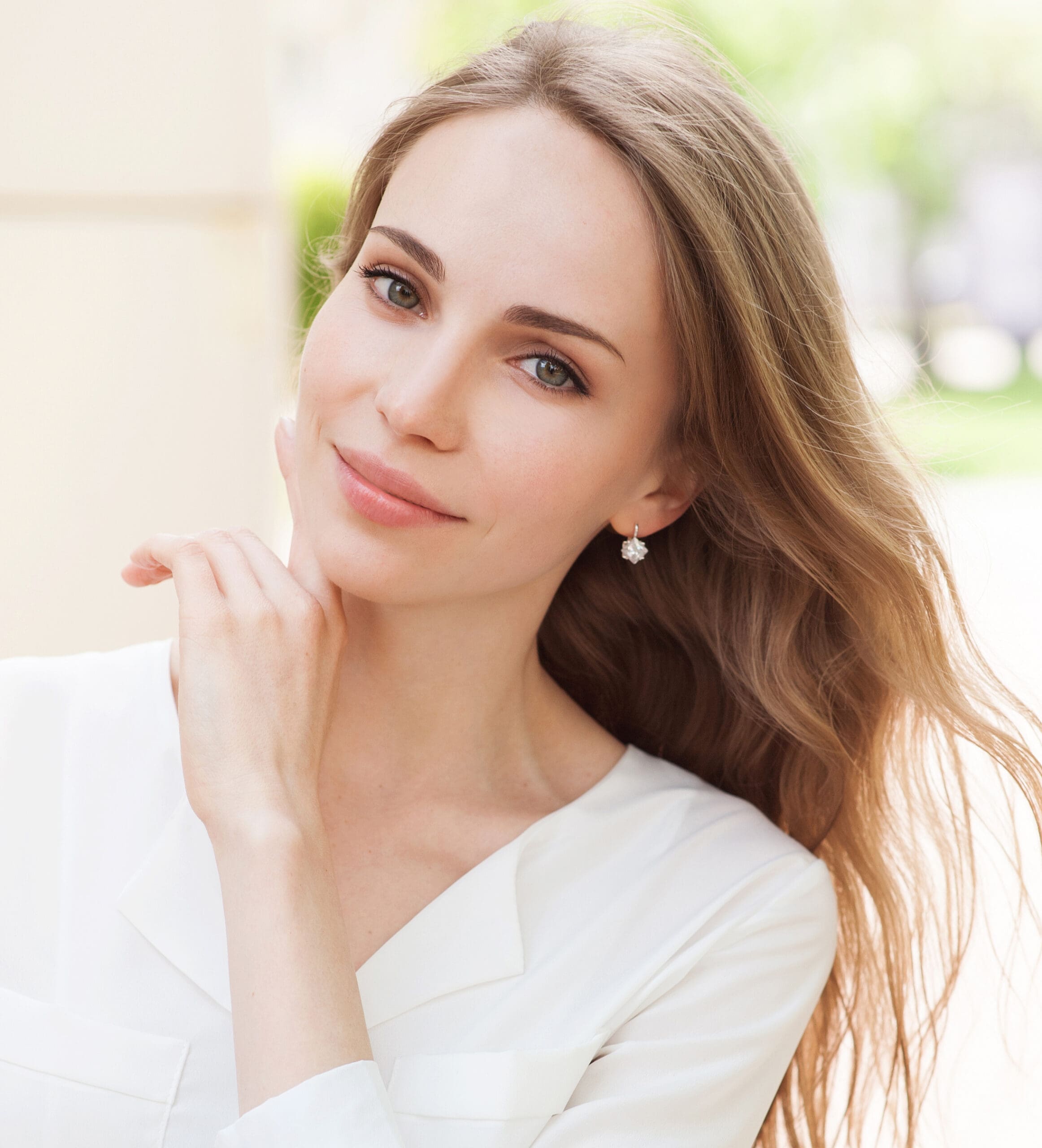 Smiling young woman outdoors Skin Care Products in West Palm Beach and Jupiter, FL
